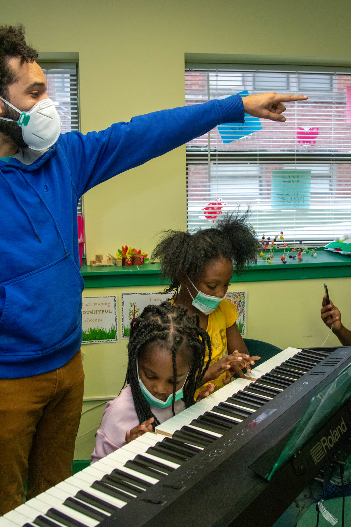 Nico Carter leading students at the keyboard
